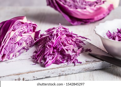 Сhopped red cabbage close-up on kitchen board. - Powered by Shutterstock