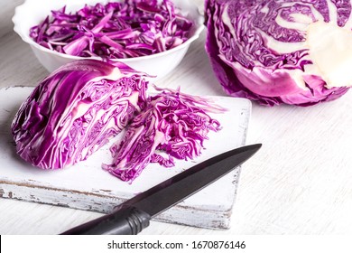 Сhopped red cabbage close-up on kitchen board. - Powered by Shutterstock