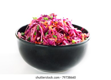 Red Cabbage Coleslaw In Bowl On White