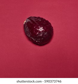 Red cabbage on a red background