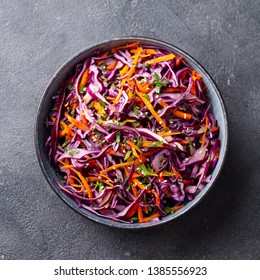 Red cabbage salad, Coleslaw in a bowl. Grey background. Close up. Top view. - Powered by Shutterstock