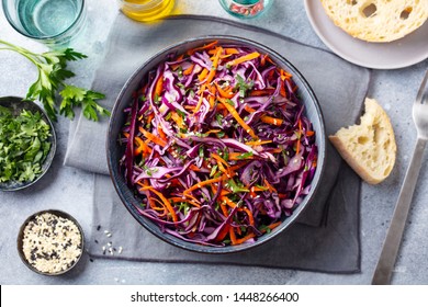 Red cabbage salad, Coleslaw in a bowl. Grey background. Top view. - Powered by Shutterstock