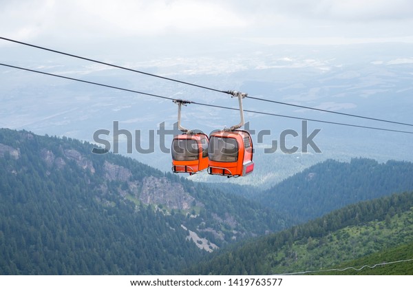 Red\
cabin lifts. Cable Car in Rila Mountain -\
Bulgaria