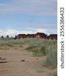 red cabins and beach in hailuoto finland