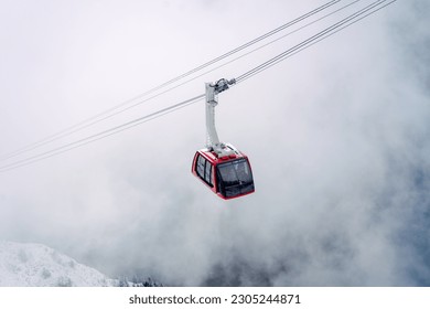 red cable car foggy surroundings, Lucerne, Switzerland - Powered by Shutterstock