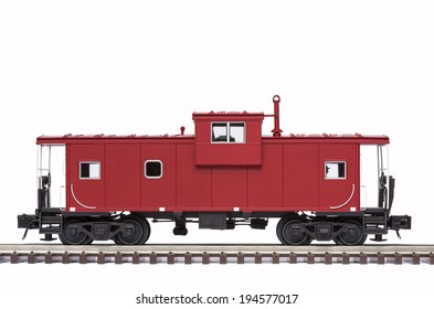 Red Caboose On Railroad Track
