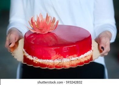 Red Cake In The Hands