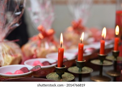 Red candle with fire. Selective focus