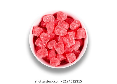 Red Candy In Bowl Isolated On White Background. Top View