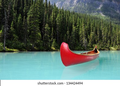 Red Canoe On Glacial Lake