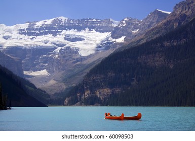 Red Canoe On Lake Louise, Banff National Park, Alberta, Canada