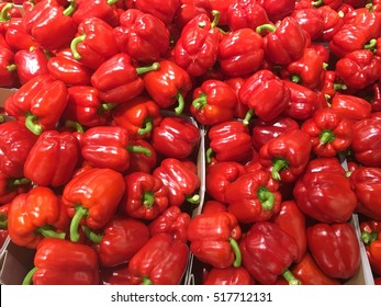 Red Capsicum Peppers In A Pile