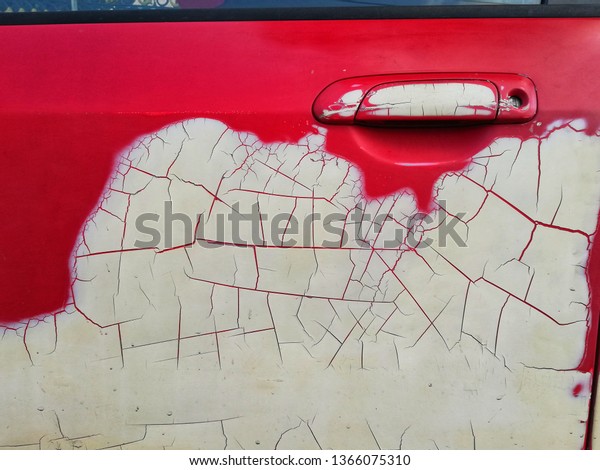 Red\
car abrasions, car paint stripping, car paint\
cracks