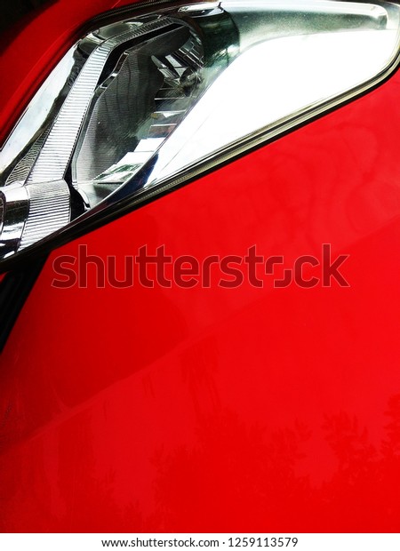 The Red Car.\
Abstract Red metallic background.\
