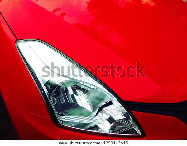 The Red Car.\
Abstract Red metallic background.\
