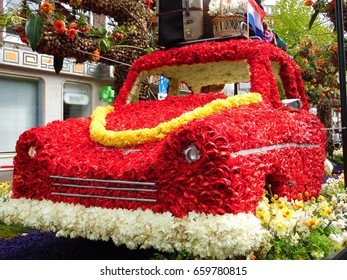 Red Car Decorated With Flowers In Flower Parade Show In Holland