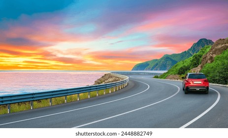 Red car driving on the panoramic road landscape in sunset. it's nice to drive on the beach side highway. Highway view on the coast on the way to summer vacation. Turkey trip on beautiful travel road. - Powered by Shutterstock