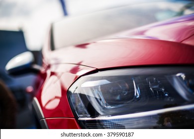 Red Car Front Detail And Closeup Headlight 