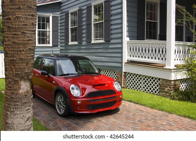 A red car and a house