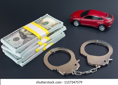  Red Car  Money Handcuffs.  Breaking The Law Auto Dealer,  Car Dealer Fraud Law Concept.