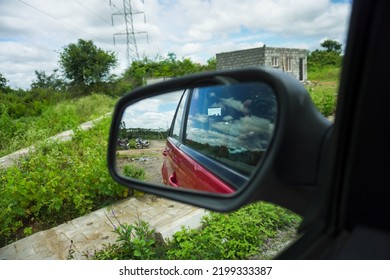 Red Car Rear View Mirror