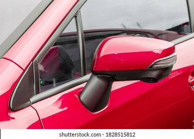 Red Car Rearview Mirror Photo