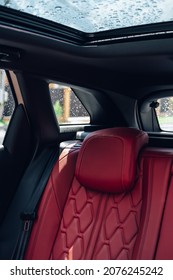 Red Car Seat With The Sunroof Under The Rain