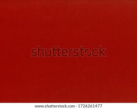 red cardboard texture useful as a background