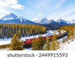 Red cargo train passing through Morant