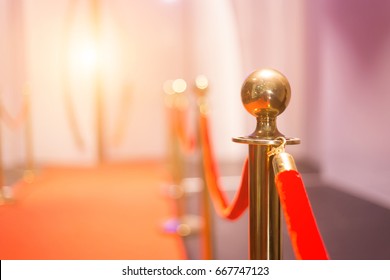 Red carpet between rope barriers in the party - Shutterstock ID 667747123