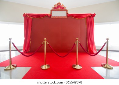 Red Carpet And Rope Barrier And Backdrop