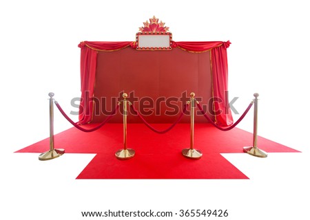 red carpet and rope barrier and backdrop on white.