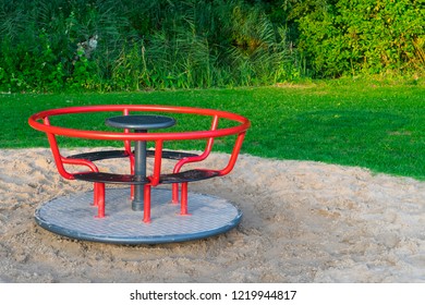 Red Carrousel In Playground