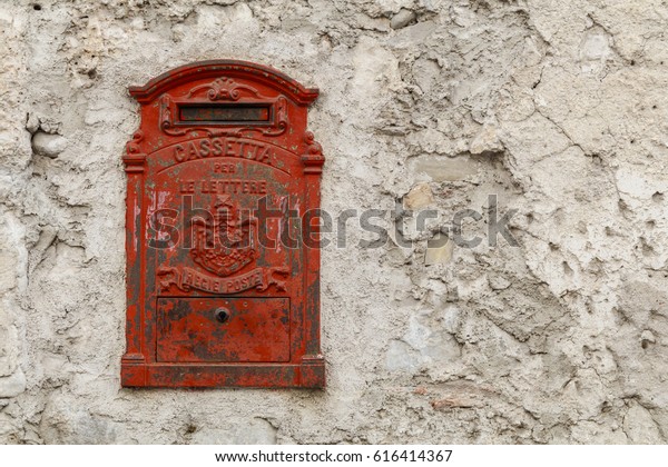 red-cast-iron-mailbox-embedded-ancient-616414367