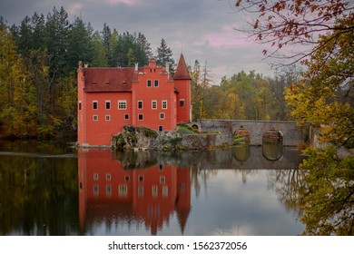 The red castle on the water - Shutterstock ID 1562372056