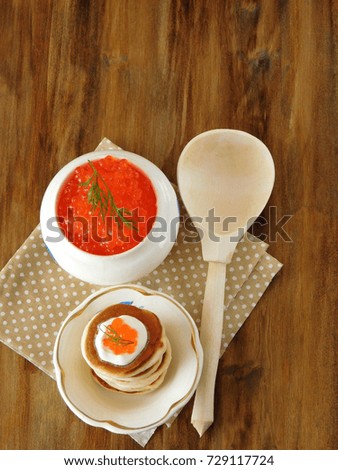 Similar – Tomatencremesuppe in roter Schüssel auf Grunge-Hintergrund