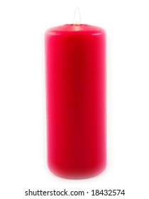 red celebratory burning candle made of paraffin on white background