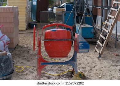 Red Cement Mixer On A Construction Site