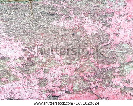 Red cement with rugged surfaceold cement wall. Old cement rugeed texture.