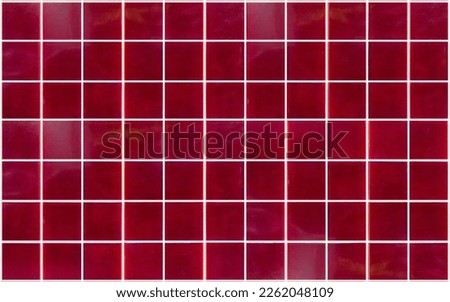 Red ceramic tile background. Old vintage ceramic tiles in red to decorate the kitchen or bathroom 