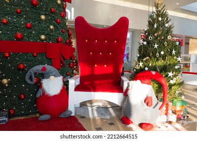 Red Chair Of Santa Claus, Christmas Trees Decoration In The Mall.