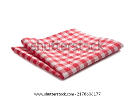 Red checkered folded cloth isolated.Picnic kitchen towel on white background.Food decor element.
