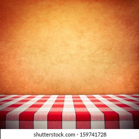 Red Checkered Tablecloth On Textured Wall