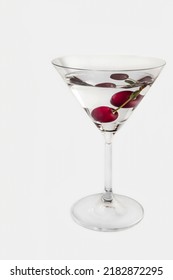 Red Cherries In Dry Martini On A White Background