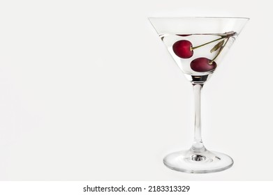 Red Cherries In Dry Martini On A White Background In Horizontal Location