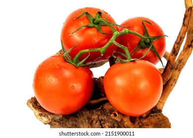 Red cherry tomatoes bunch closeup in white backgroud isolated with nobody extendable background shot using studio lighting and macro 100mm lens. 