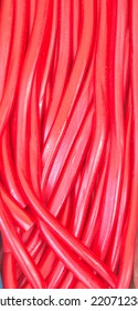 Red Chewy Strawberry Laces As A Background Image