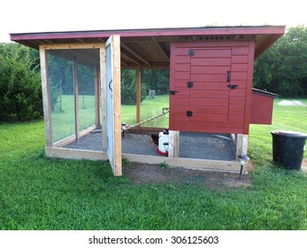 Red Chicken Coop Made Of Wood And Screen   