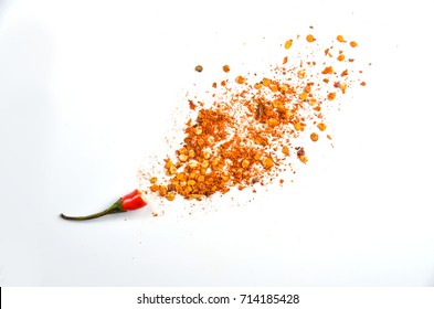 Red chili exploded into small pieces with many seed inside and dried chili powder