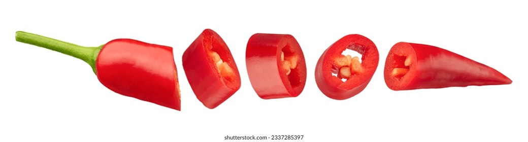 Red chili pepper on a white isolated background. Pepper cut into slices on a white background close-up. Isolate of different parts of hot pepper. High quality photo.